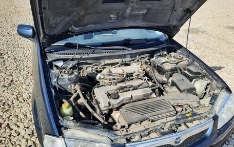 Mazda 323, 1999 год, 450 000 рублей, 9 фотография