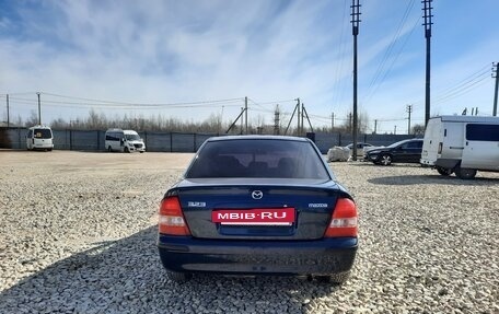 Mazda 323, 1999 год, 450 000 рублей, 3 фотография