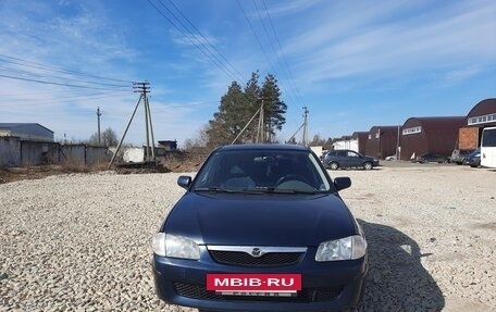 Mazda 323, 1999 год, 450 000 рублей, 7 фотография