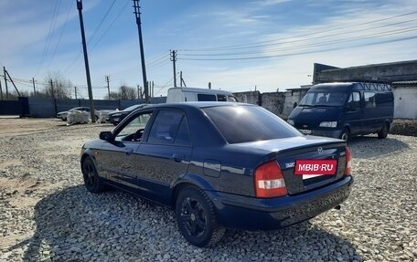 Mazda 323, 1999 год, 450 000 рублей, 4 фотография