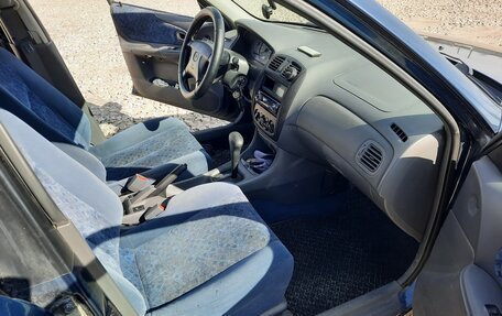 Mazda 323, 1999 год, 450 000 рублей, 16 фотография