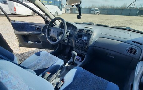 Mazda 323, 1999 год, 450 000 рублей, 26 фотография