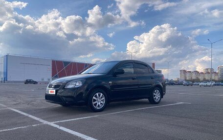 KIA Rio II, 2010 год, 666 666 рублей, 21 фотография