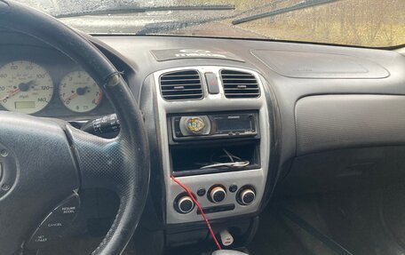 Mazda Protege, 2001 год, 100 000 рублей, 7 фотография