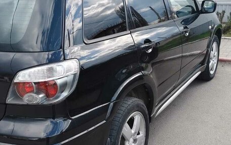 Mitsubishi Outlander III рестайлинг 3, 2006 год, 700 000 рублей, 2 фотография