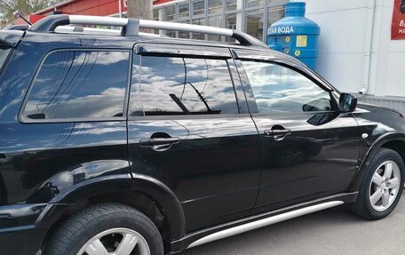 Mitsubishi Outlander III рестайлинг 3, 2006 год, 700 000 рублей, 4 фотография