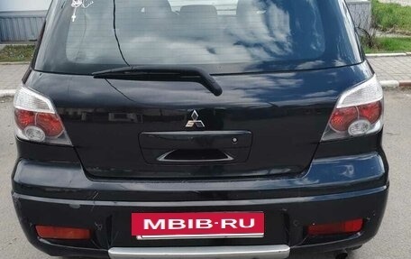 Mitsubishi Outlander III рестайлинг 3, 2006 год, 700 000 рублей, 5 фотография
