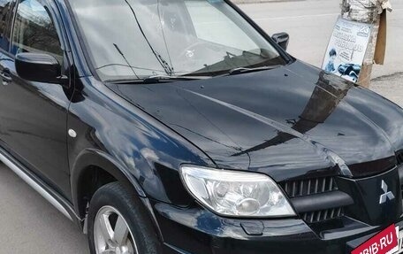 Mitsubishi Outlander III рестайлинг 3, 2006 год, 700 000 рублей, 11 фотография