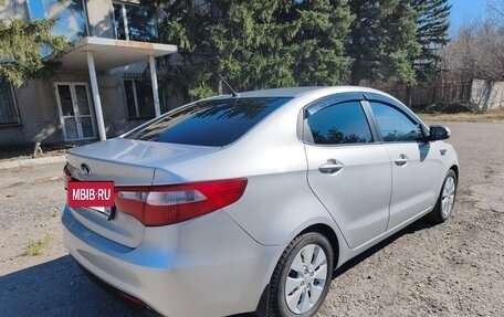 KIA Rio III рестайлинг, 2013 год, 890 000 рублей, 39 фотография