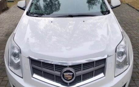 Cadillac SRX II рестайлинг, 2011 год, 880 000 рублей, 3 фотография