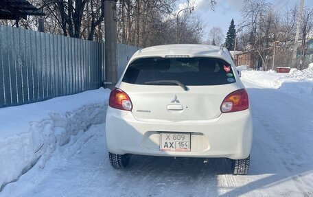 Mitsubishi Mirage VI рестайлинг, 2012 год, 750 000 рублей, 5 фотография