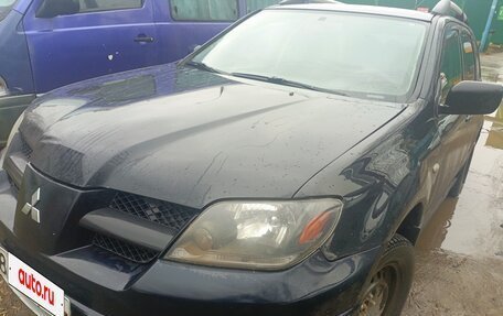 Mitsubishi Outlander III рестайлинг 3, 2003 год, 395 000 рублей, 9 фотография