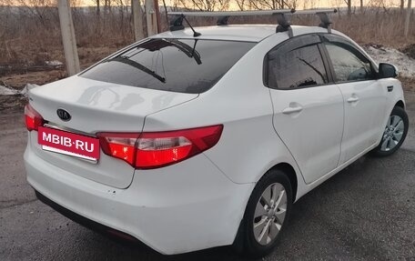 KIA Rio III рестайлинг, 2012 год, 900 000 рублей, 11 фотография