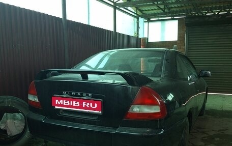 Mitsubishi Mirage VI рестайлинг, 1996 год, 100 000 рублей, 2 фотография