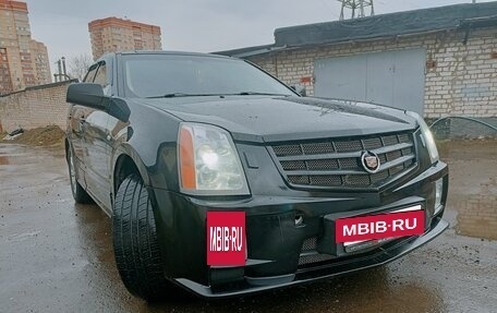Cadillac SRX II рестайлинг, 2008 год, 900 000 рублей, 3 фотография