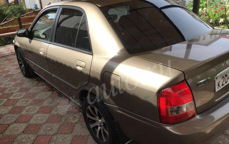 Mazda Protege, 1999 год, 185 000 рублей, 3 фотография