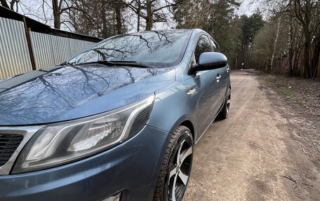 KIA Rio III рестайлинг, 2013 год, 670 000 рублей, 19 фотография