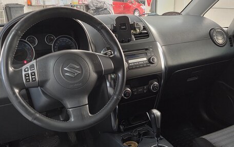 Suzuki SX4 II рестайлинг, 2010 год, 1 000 000 рублей, 19 фотография