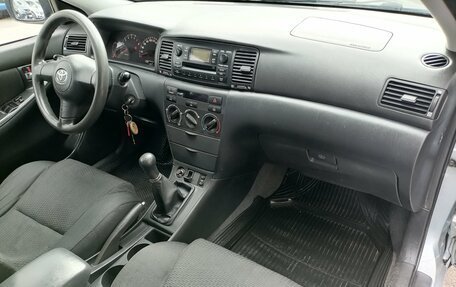 Toyota Corolla, 2004 год, 10 фотография