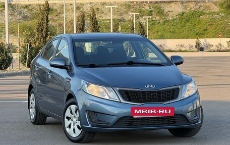 KIA Rio III рестайлинг, 2012 год, 730 000 рублей, 2 фотография