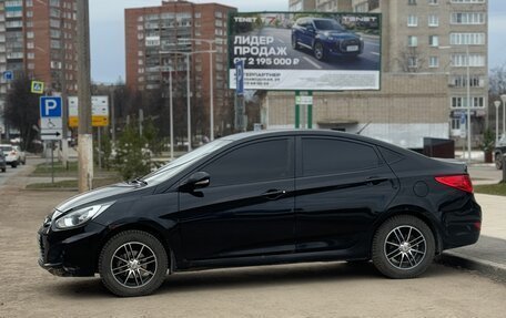 Hyundai Solaris II рестайлинг, 2011 год, 590 000 рублей, 8 фотография