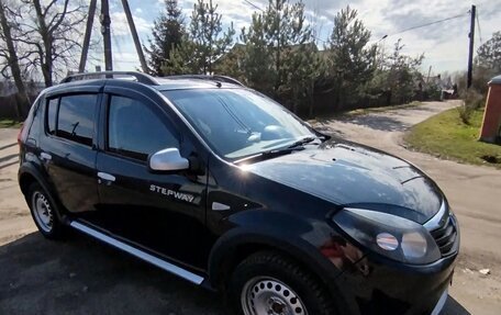 Renault Sandero I, 2012 год, 649 999 рублей, 1 фотография