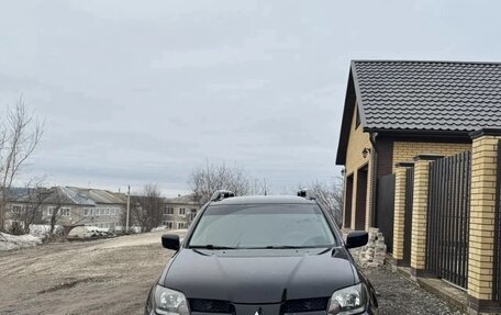 Mitsubishi Outlander III рестайлинг 3, 2004 год, 730 000 рублей, 2 фотография