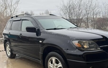 Mitsubishi Outlander III рестайлинг 3, 2004 год, 730 000 рублей, 3 фотография