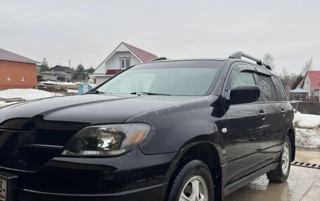 Mitsubishi Outlander III рестайлинг 3, 2004 год, 730 000 рублей, 4 фотография