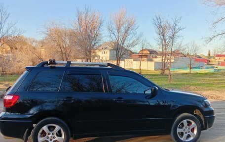 Mitsubishi Outlander III рестайлинг 3, 2006 год, 710 000 рублей, 3 фотография