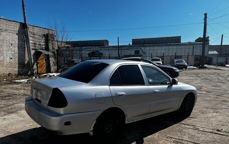 Mitsubishi Mirage VI рестайлинг, 2001 год, 89 000 рублей, 3 фотография