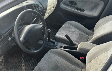 Mitsubishi Mirage VI рестайлинг, 2001 год, 89 000 рублей, 6 фотография