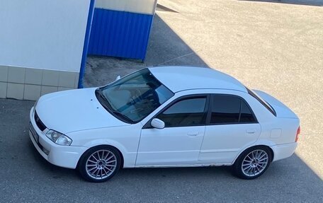 Mazda Familia, 1999 год, 260 000 рублей, 1 фотография