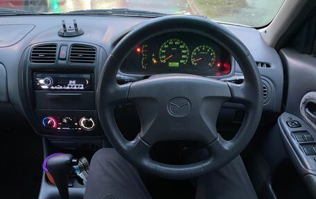 Mazda Familia, 1999 год, 260 000 рублей, 10 фотография