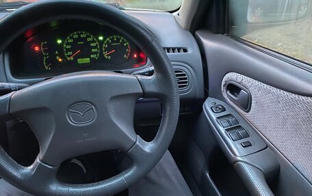 Mazda Familia, 1999 год, 260 000 рублей, 9 фотография