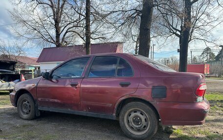 Nissan Almera, 1998 год, 60 000 рублей, 4 фотография