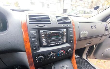 KIA Carnival III, 2004 год, 650 000 рублей, 9 фотография