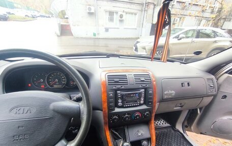 KIA Carnival III, 2004 год, 650 000 рублей, 6 фотография