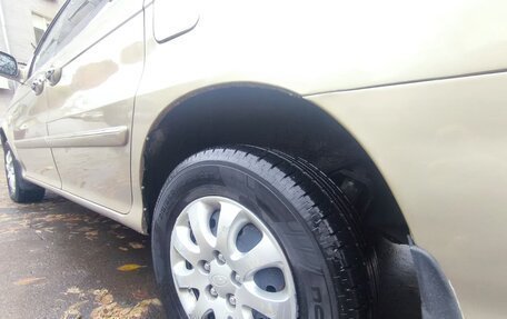 KIA Carnival III, 2004 год, 650 000 рублей, 11 фотография