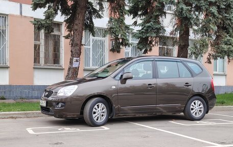 KIA Carens III (RP), 2011 год, 1 099 000 рублей, 2 фотография