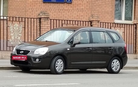 KIA Carens III (RP), 2011 год, 1 099 000 рублей, 3 фотография