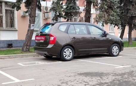 KIA Carens III (RP), 2011 год, 1 099 000 рублей, 7 фотография