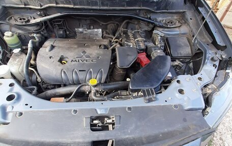 Mitsubishi Outlander III рестайлинг 3, 2010 год, 1 150 000 рублей, 14 фотография