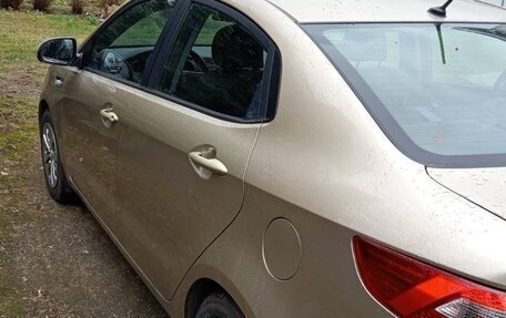 KIA Rio III рестайлинг, 2013 год, 4 фотография