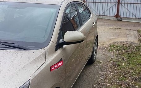 KIA Rio III рестайлинг, 2013 год, 7 фотография