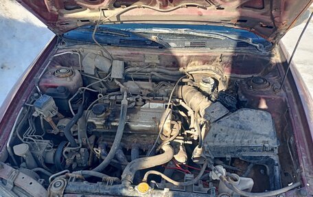 Mitsubishi Carisma I, 1999 год, 60 000 рублей, 7 фотография