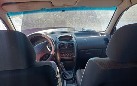 Mitsubishi Carisma I, 1999 год, 60 000 рублей, 6 фотография