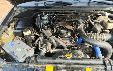 Nissan Navara (Frontier), 2006 год, 850 000 рублей, 14 фотография