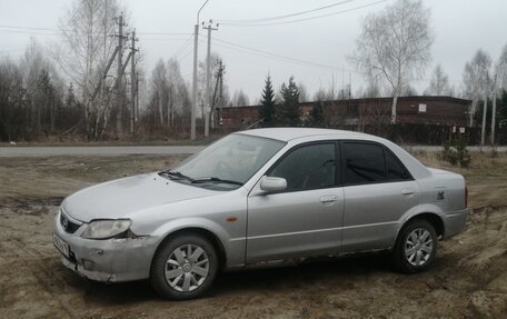 Mazda Familia, 2001 год, 400 000 рублей, 8 фотография