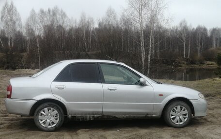 Mazda Familia, 2001 год, 400 000 рублей, 6 фотография